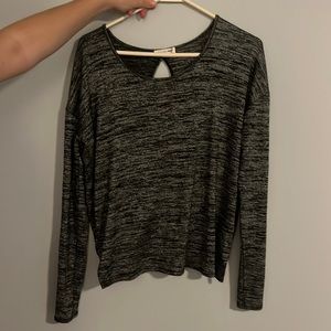 dark gray long sleeved shirt with cut out